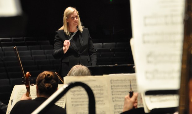 Gina Provenzano conducts the Warren Symphony Orchestra, which will present the first of its three-part concert series dedicated to American composers on November 13 at 3 p.m.  Photo courtesy of the WSO